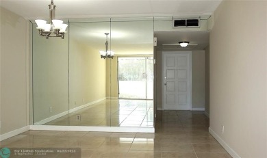 *Fully renovated first-floor condo in lush Palm Aire featuring on Palm-Aire Country Club and Resort - Palms in Florida - for sale on GolfHomes.com, golf home, golf lot