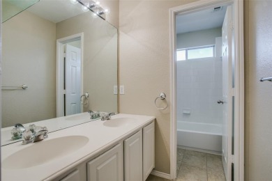 2.3 miles from the Dallas North Tollway is this stunning home in on The Trails of Frisco Golf Club in Texas - for sale on GolfHomes.com, golf home, golf lot