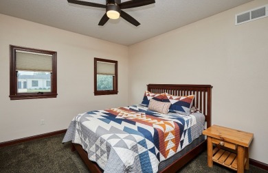 Welcome to your dream home nestled on a serene corner cul-de-sac on Deer Run Golf Club and DR in Iowa - for sale on GolfHomes.com, golf home, golf lot