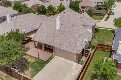 2.3 miles from the Dallas North Tollway is this stunning home in on The Trails of Frisco Golf Club in Texas - for sale on GolfHomes.com, golf home, golf lot
