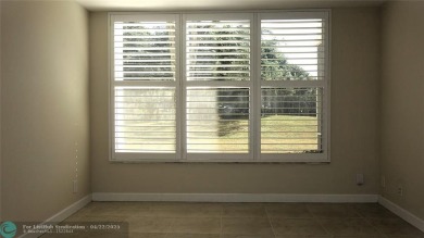 *Fully renovated first-floor condo in lush Palm Aire featuring on Palm-Aire Country Club and Resort - Palms in Florida - for sale on GolfHomes.com, golf home, golf lot