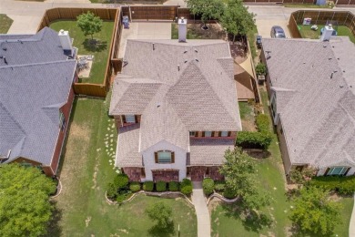 2.3 miles from the Dallas North Tollway is this stunning home in on The Trails of Frisco Golf Club in Texas - for sale on GolfHomes.com, golf home, golf lot