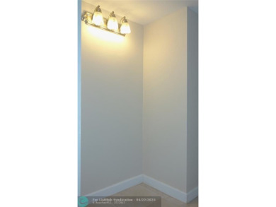 *Fully renovated first-floor condo in lush Palm Aire featuring on Palm-Aire Country Club and Resort - Palms in Florida - for sale on GolfHomes.com, golf home, golf lot