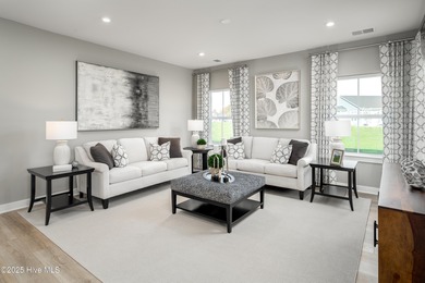 Step into style and comfort with this beautifully designed ranch on Sea Trail Golf Resort in North Carolina - for sale on GolfHomes.com, golf home, golf lot