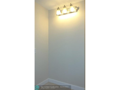 *Fully renovated first-floor condo in lush Palm Aire featuring on Palm-Aire Country Club and Resort - Palms in Florida - for sale on GolfHomes.com, golf home, golf lot