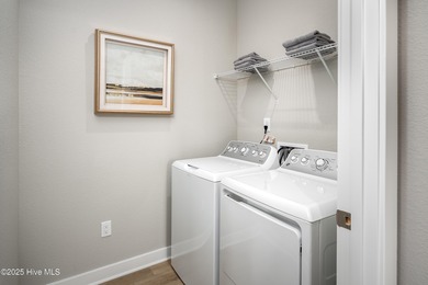 Step into style and comfort with this beautifully designed ranch on Sea Trail Golf Resort in North Carolina - for sale on GolfHomes.com, golf home, golf lot