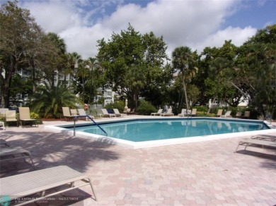 *Fully renovated first-floor condo in lush Palm Aire featuring on Palm-Aire Country Club and Resort - Palms in Florida - for sale on GolfHomes.com, golf home, golf lot