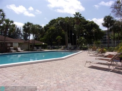 *Fully renovated first-floor condo in lush Palm Aire featuring on Palm-Aire Country Club and Resort - Palms in Florida - for sale on GolfHomes.com, golf home, golf lot