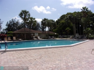 *Fully renovated first-floor condo in lush Palm Aire featuring on Palm-Aire Country Club and Resort - Palms in Florida - for sale on GolfHomes.com, golf home, golf lot