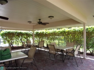 *Fully renovated first-floor condo in lush Palm Aire featuring on Palm-Aire Country Club and Resort - Palms in Florida - for sale on GolfHomes.com, golf home, golf lot