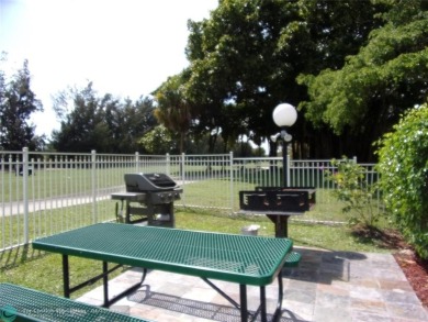 *Fully renovated first-floor condo in lush Palm Aire featuring on Palm-Aire Country Club and Resort - Palms in Florida - for sale on GolfHomes.com, golf home, golf lot