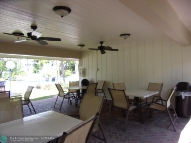 *Fully renovated first-floor condo in lush Palm Aire featuring on Palm-Aire Country Club and Resort - Palms in Florida - for sale on GolfHomes.com, golf home, golf lot