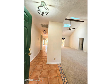 Sturdy, well maintained home located a few miles to the beaches on Carolina Shores Golf Course in North Carolina - for sale on GolfHomes.com, golf home, golf lot