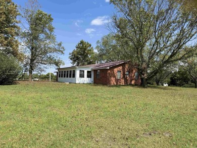 FOR SALE, A BEAUTIFUL REMODELED 3-bedroom, 2-bath brick home in on Coopers Hawk in Arkansas - for sale on GolfHomes.com, golf home, golf lot