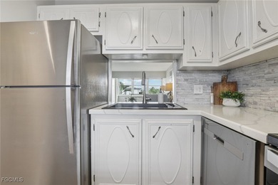 Stunning 2 Bed, 2 Bath Top-Floor Condo in Premier 55+ Gated Golf on Seven Lakes Golf and Tennis Community in Florida - for sale on GolfHomes.com, golf home, golf lot