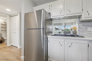 Stunning 2 Bed, 2 Bath Top-Floor Condo in Premier 55+ Gated Golf on Seven Lakes Golf and Tennis Community in Florida - for sale on GolfHomes.com, golf home, golf lot