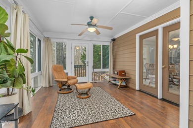 Set along the 13th green in The River subdivision of Lake Royale on River Golf and Country Club at Lake Royale in North Carolina - for sale on GolfHomes.com, golf home, golf lot