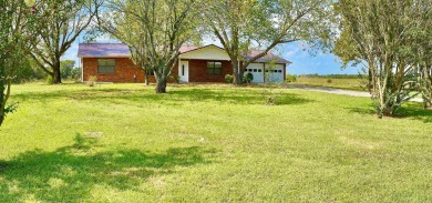 FOR SALE: This beautifully remodeled 3-bedroom, 2-bathroom brick on Coopers Hawk in Arkansas - for sale on GolfHomes.com, golf home, golf lot