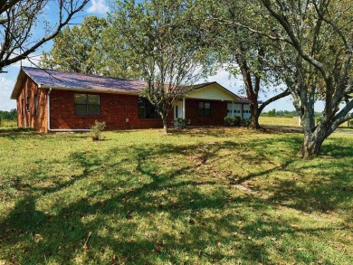 FOR SALE: This beautifully remodeled 3-bedroom, 2-bathroom brick on Coopers Hawk in Arkansas - for sale on GolfHomes.com, golf home, golf lot