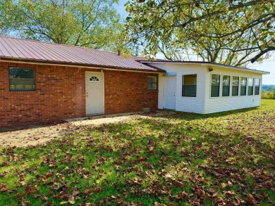 FOR SALE: This beautifully remodeled 3-bedroom, 2-bathroom brick on Coopers Hawk in Arkansas - for sale on GolfHomes.com, golf home, golf lot