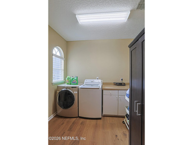 Located in the sought-after Magnolia Point Golf and Country Club on Magnolia Point Golf and Country Club in Florida - for sale on GolfHomes.com, golf home, golf lot