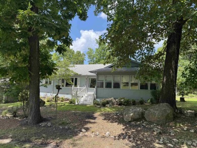 Looking for Golf Course living?  This fantastic condition home on Cherokee Village South Course in Arkansas - for sale on GolfHomes.com, golf home, golf lot
