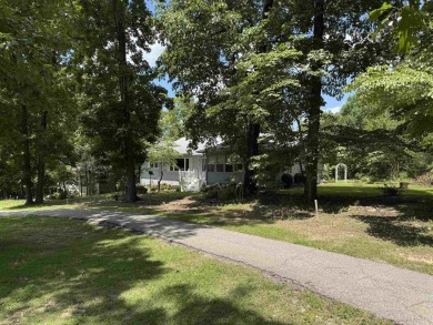Looking for Golf Course living?  This fantastic condition home on Cherokee Village South Course in Arkansas - for sale on GolfHomes.com, golf home, golf lot