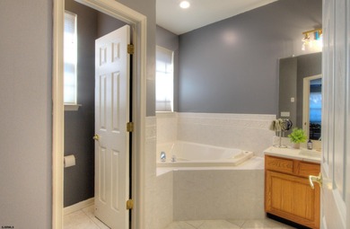 Welcome home to this stunning ranch-style retreat located in the on Blue Heron Pines Golf Club in New Jersey - for sale on GolfHomes.com, golf home, golf lot