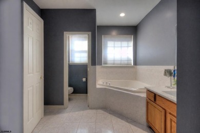 Welcome home to this stunning ranch-style retreat located in the on Blue Heron Pines Golf Club in New Jersey - for sale on GolfHomes.com, golf home, golf lot