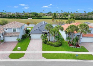 This stylish, renovated and nicely decorated home is located in on The Wanderers Club in Florida - for sale on GolfHomes.com, golf home, golf lot