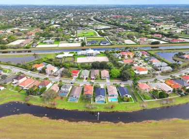 This stylish, renovated and nicely decorated home is located in on The Wanderers Club in Florida - for sale on GolfHomes.com, golf home, golf lot