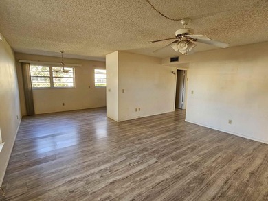 Enjoy relaxed Florida living in this desirable first-floor on Vero Beach South Golf Course in Florida - for sale on GolfHomes.com, golf home, golf lot