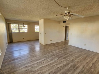 Enjoy relaxed Florida living in this desirable first-floor on Vero Beach South Golf Course in Florida - for sale on GolfHomes.com, golf home, golf lot