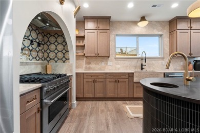 Experience luxury in this stunning 5,500 sq ft home that blends on The Club At Porto Cima in Missouri - for sale on GolfHomes.com, golf home, golf lot