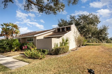 Step into this beautifully updated 2-bedroom, 2-bath end unit on Imperial Lakes Country Club in Florida - for sale on GolfHomes.com, golf home, golf lot