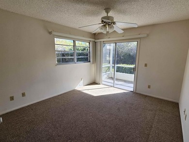 Enjoy relaxed Florida living in this desirable first-floor on Vero Beach South Golf Course in Florida - for sale on GolfHomes.com, golf home, golf lot