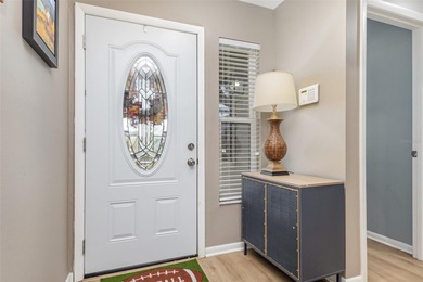 Step into this beautifully updated 2-bedroom, 2-bath end unit on Imperial Lakes Country Club in Florida - for sale on GolfHomes.com, golf home, golf lot