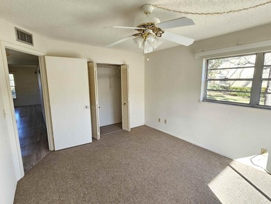 Enjoy relaxed Florida living in this desirable first-floor on Vero Beach South Golf Course in Florida - for sale on GolfHomes.com, golf home, golf lot