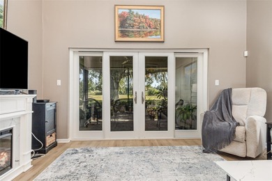 Step into this beautifully updated 2-bedroom, 2-bath end unit on Imperial Lakes Country Club in Florida - for sale on GolfHomes.com, golf home, golf lot