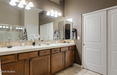 Discover this beautifully maintained 2BR, 2-BA, Den main home on Quail Creek Country Club  in Arizona - for sale on GolfHomes.com, golf home, golf lot
