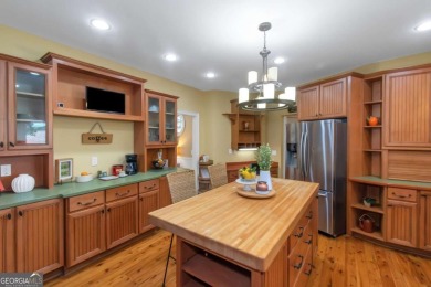 Welcome to your dream home-a true Southern Charmer nestled in on Eagles Landing Country Club in Georgia - for sale on GolfHomes.com, golf home, golf lot