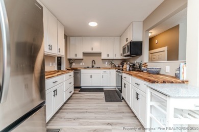 Seller has outgrown this beautifully updated 2-bedroom on Carolina Trace Country Club in North Carolina - for sale on GolfHomes.com, golf home, golf lot
