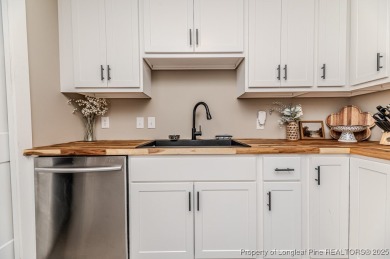 Seller has outgrown this beautifully updated 2-bedroom on Carolina Trace Country Club in North Carolina - for sale on GolfHomes.com, golf home, golf lot
