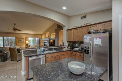 Discover this beautifully maintained 2BR, 2-BA, Den main home on Quail Creek Country Club  in Arizona - for sale on GolfHomes.com, golf home, golf lot