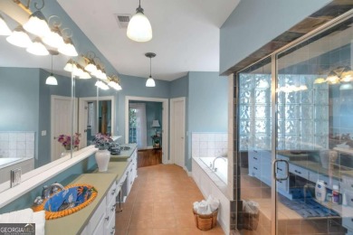 Welcome to your dream home-a true Southern Charmer nestled in on Eagles Landing Country Club in Georgia - for sale on GolfHomes.com, golf home, golf lot