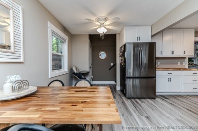 Seller has outgrown this beautifully updated 2-bedroom on Carolina Trace Country Club in North Carolina - for sale on GolfHomes.com, golf home, golf lot