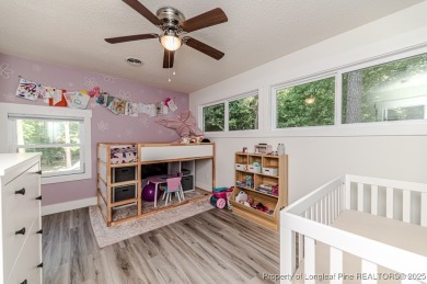Seller has outgrown this beautifully updated 2-bedroom on Carolina Trace Country Club in North Carolina - for sale on GolfHomes.com, golf home, golf lot