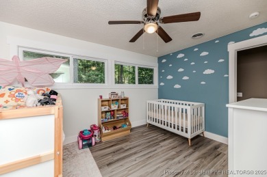 Seller has outgrown this beautifully updated 2-bedroom on Carolina Trace Country Club in North Carolina - for sale on GolfHomes.com, golf home, golf lot