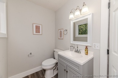 Seller has outgrown this beautifully updated 2-bedroom on Carolina Trace Country Club in North Carolina - for sale on GolfHomes.com, golf home, golf lot
