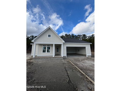 The Coventry welcomes you home. This newly-constructed 3-bedroom on Carolina Colours Golf Club in North Carolina - for sale on GolfHomes.com, golf home, golf lot